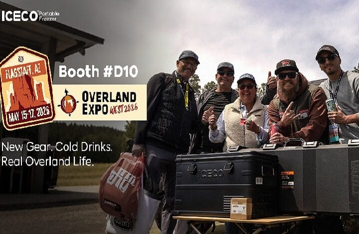 Six people pose at an ICECO booth (Booth D10) at Overland Expo West, near a large portable freezer display with a banner reading 'New Gear. Cold Drinks. Real Overland Life.'