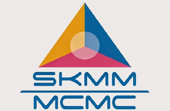 Brand logo featuring a large multicolored triangle (orange left, blue right, pink base) with a circular overlap, above the blue text 'SKMM MEMC' separated by a horizontal line.