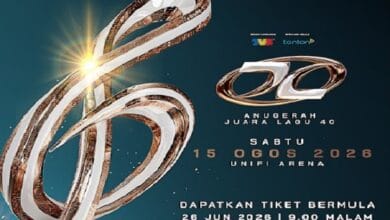 Poster announcing Anugerah Juara Lagu 40 with metallic gold logo, event details: Sat 15 Aug 2026 at Unifi Arena; tickets from 26 Jun 2026 at wowtix.com.my
