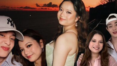 kasih oris leona - Wilayah.com.my Group of five young friends posing for a sunset beach selfie; the central woman wears a pale-green dress and smiles as others surround her.