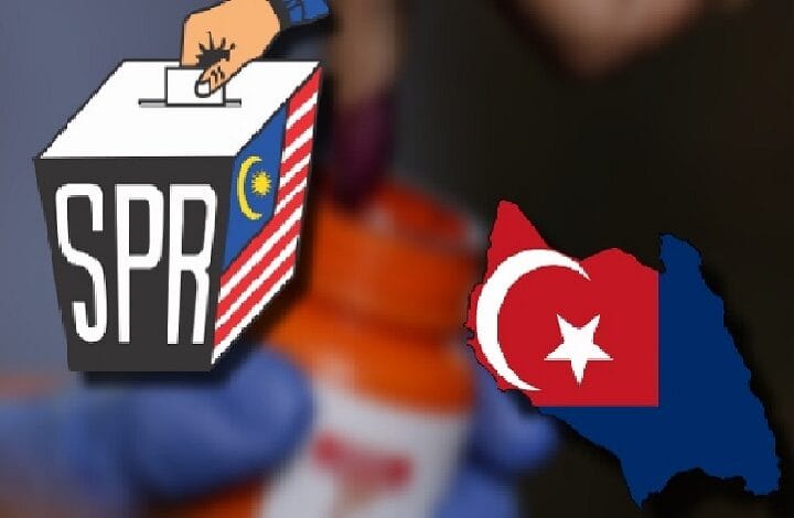 Person in a blue glove casts a ballot into an SPR box featuring a Malaysian flag motif; a red Turkish map with white crescent and star is nearby.