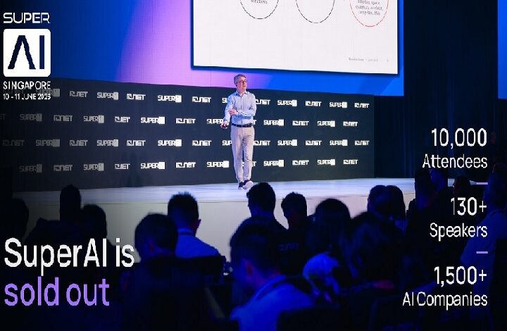 Speaker on a stage presenting to a darkened audience at SuperAI Singapore; large screen shows a chart while 'SuperAI is sold out' appears on the left and event banners surround the stage.