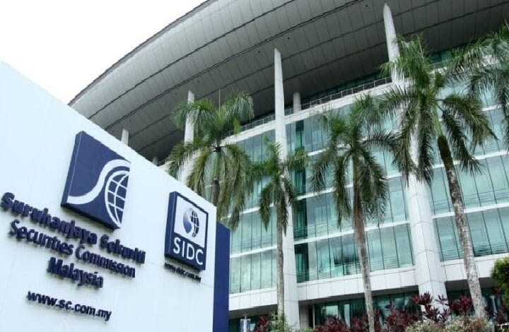 suruhanjaya sekuriti security sc - Wilayah.com.my Modern glass-fronted office building with tall palm trees in front and signage for Securities Commission Malaysia.