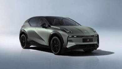 zeekr x - Wilayah.com.my Three-quarter front view of a gray-green electric SUV with a black roof and dark wheels.