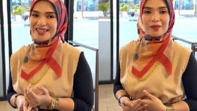 adik waniey - Wilayah.com.my Two side-by-side portraits of a woman wearing a red and beige hijab and beige top with gold jewelry, smiling on the left and neutral on the right in a bright indoor setting on a glass-walled backdrop.