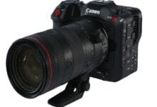 canon eos70 - Wilayah.com.my Canon EOS camera with a large zoom lens mounted, shown from a front-left angle.