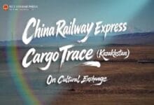 china railway express - Wilayah.com.my Poster banner for China Railway Express Cargo Trace (Kazakhstan) on Cultural Exchange, set against a desert landscape with a rainbow arc in the foreground.