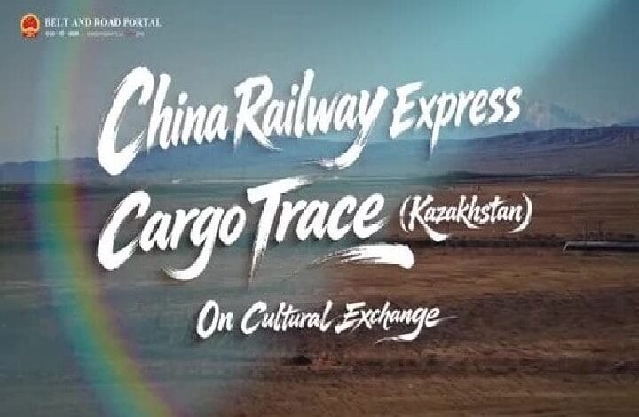 china railway express - Wilayah.com.my Poster banner for China Railway Express Cargo Trace (Kazakhstan) on Cultural Exchange, set against a desert landscape with a rainbow arc in the foreground.