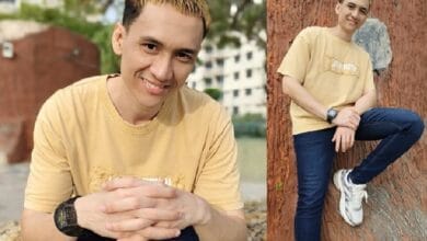 raja afiq 2 - Wilayah.com.my Young man in a pale yellow shirt smiling with hands clasped, in a park-like setting (left panel).
