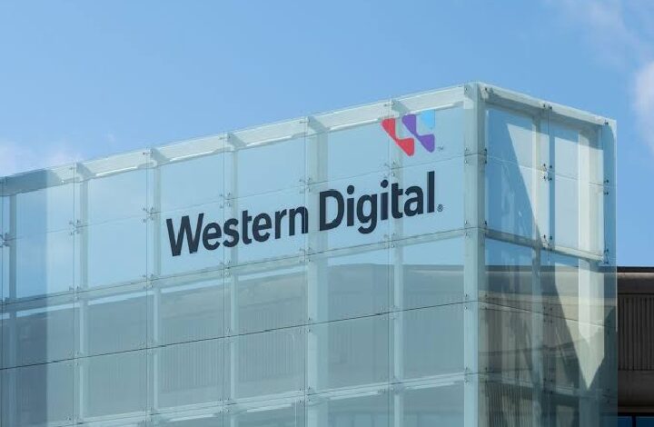 western digital 2 - Wilayah.com.my Glass-walled building with the Western Digital logo and name against a blue sky.